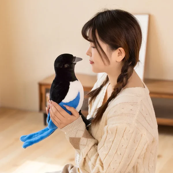 Jouet en peluche en forme de pigeon